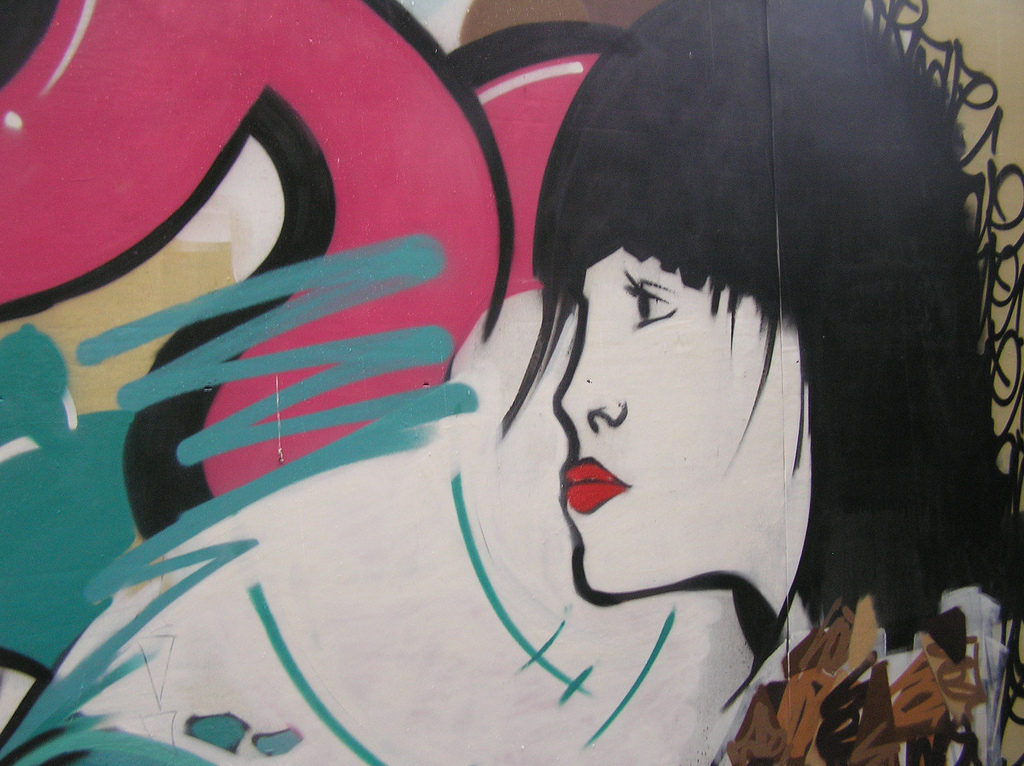 Street art, profile of a young woman