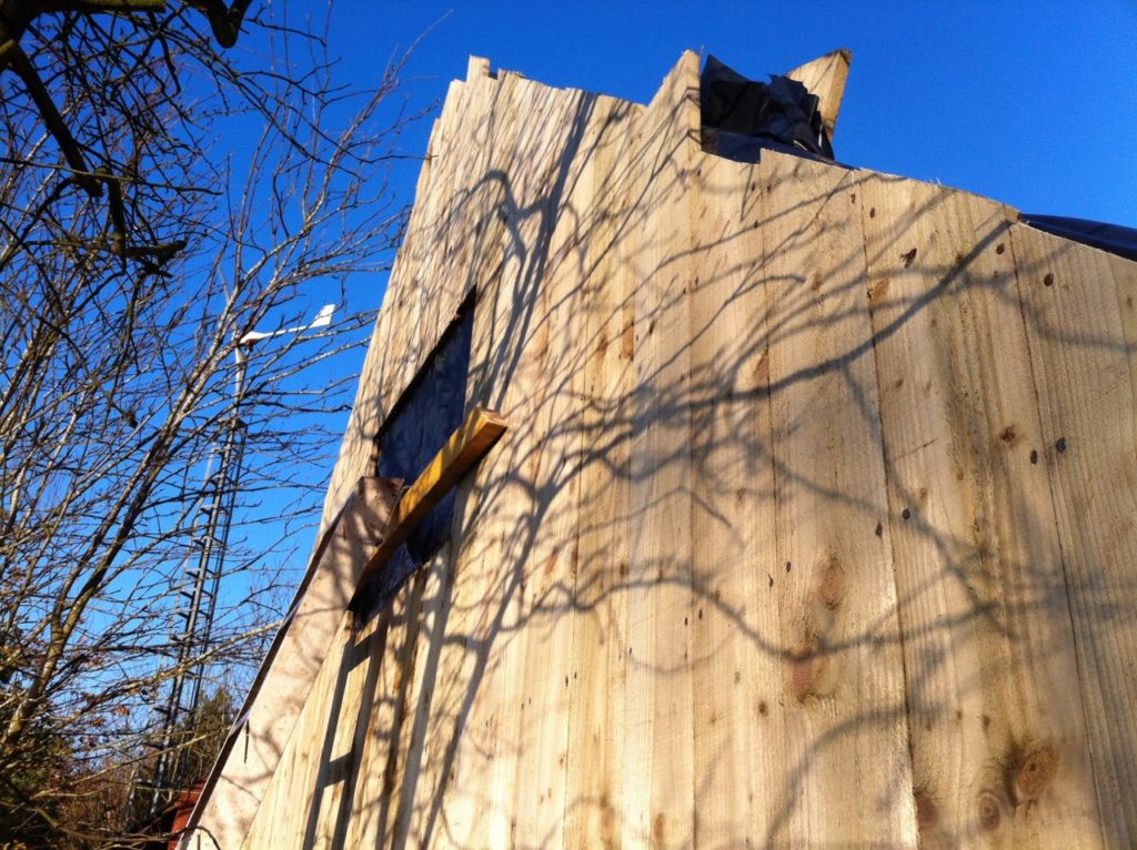 Sunshine on wooden hut under construction