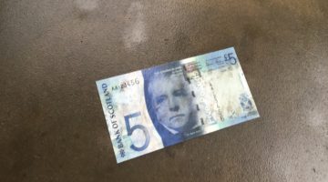 A wet Bank of Scotland £5 note