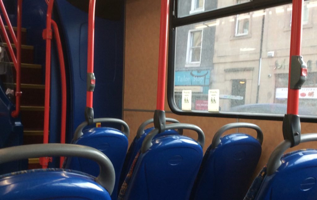 Empty priority seats on the Number 14 bus through Edinburgh