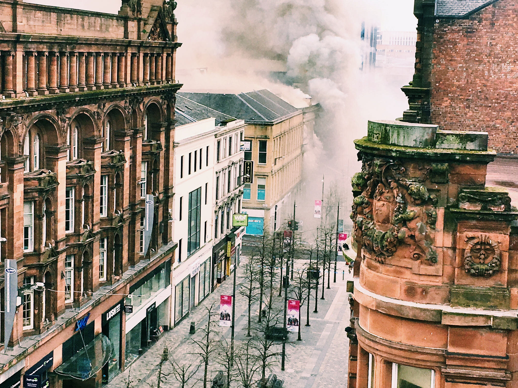 Rooftop view. Looking down Sauchiehall Street towards the fire of March 2018. Glasgow fire: smoke on Sauchiehall Street. Alasdair Clark CC By-SA-2.0