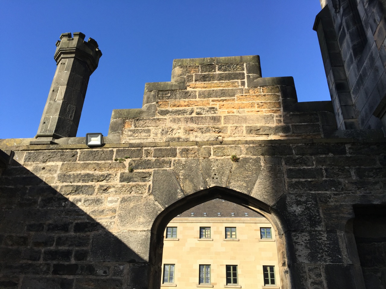 Late afternoon sun casts shadows on the old Leith Baths