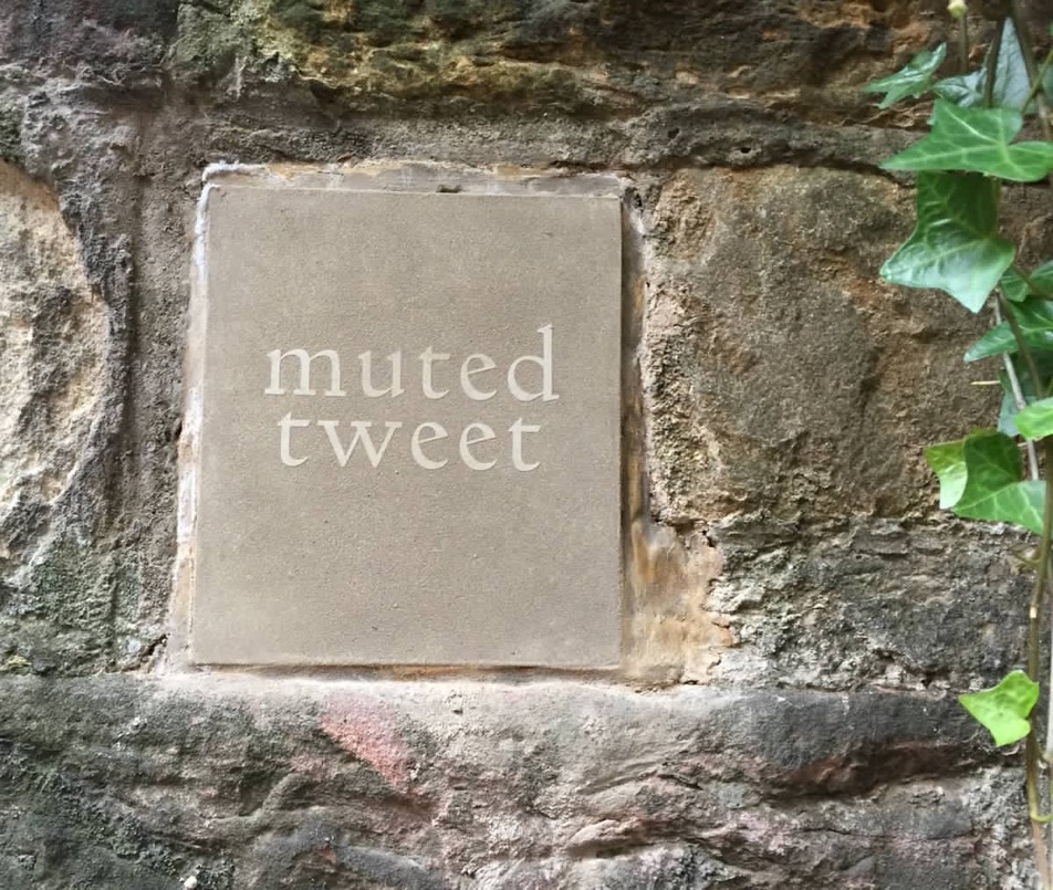 Muted Tweet, words set in stone wall, part of Open Close installation by Tommy Perman, Rob St John for Edinburgh Fringe Festival 2017