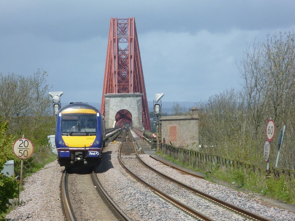 Train approaching Forth Road Bridge: by Kim Traynor