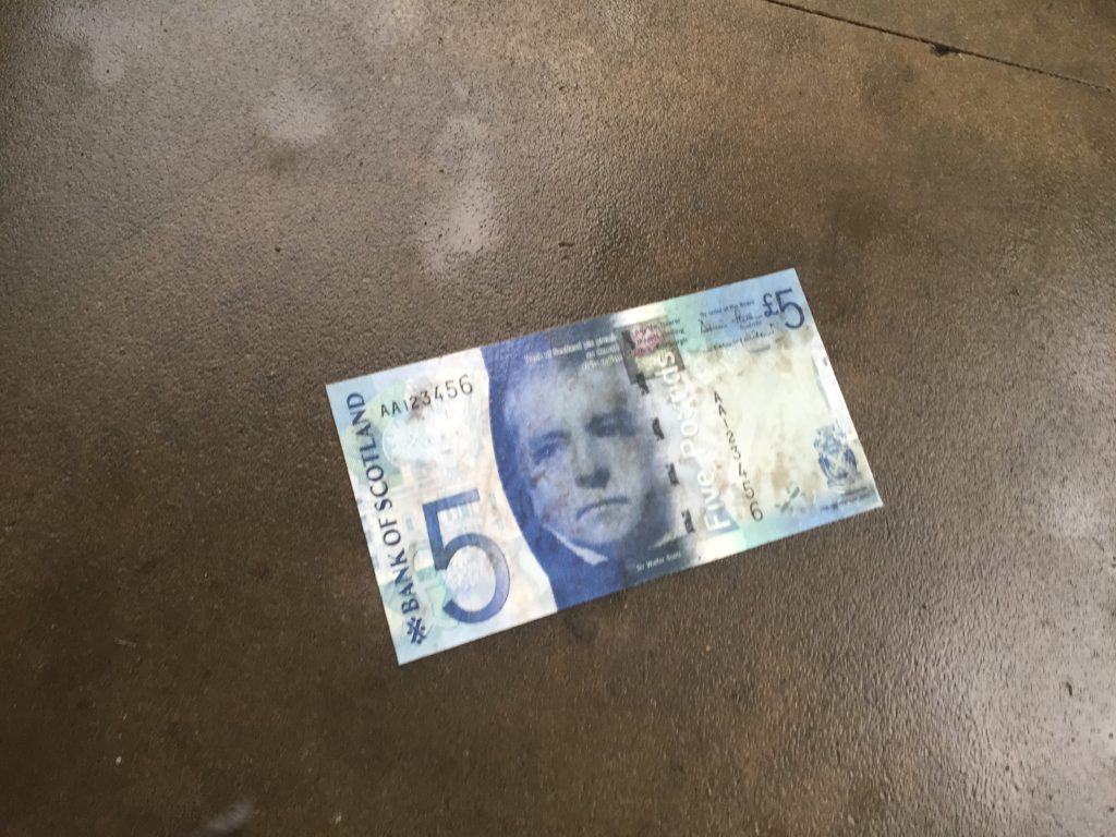 A wet Bank of Scotland £5 note