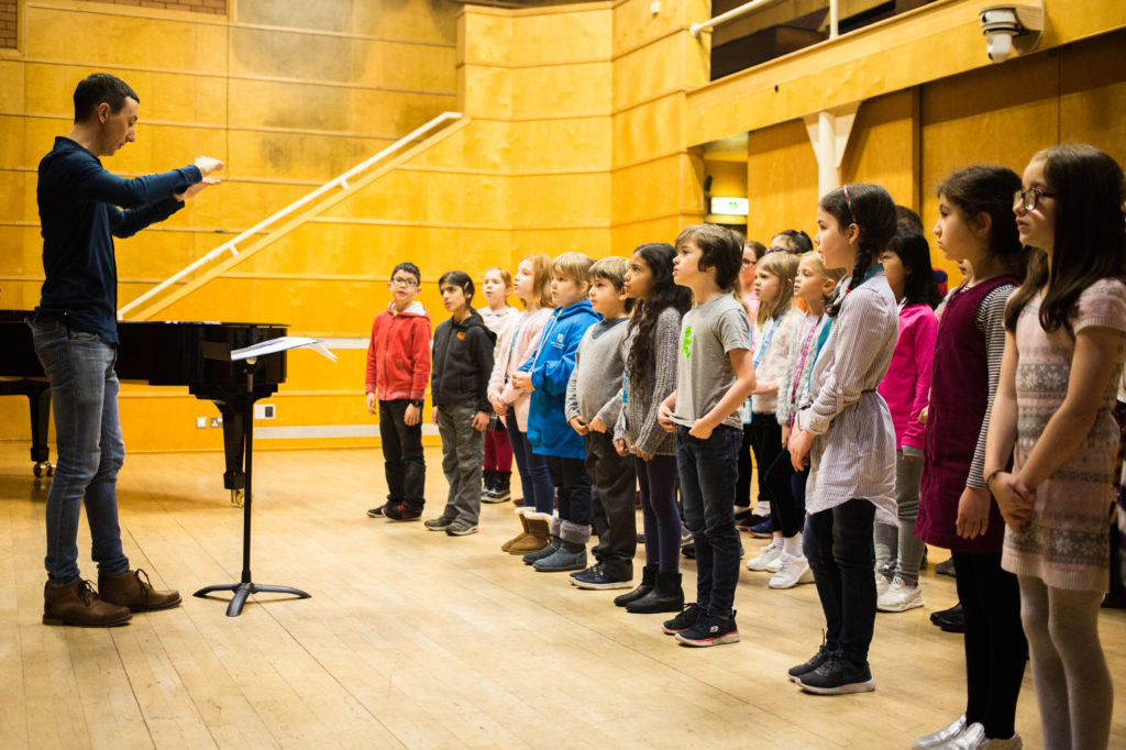 Children singing, eyes firmly fixed on the conductor. Photo Robert McFadzean, courtesy Royal Conservatoire Scotland