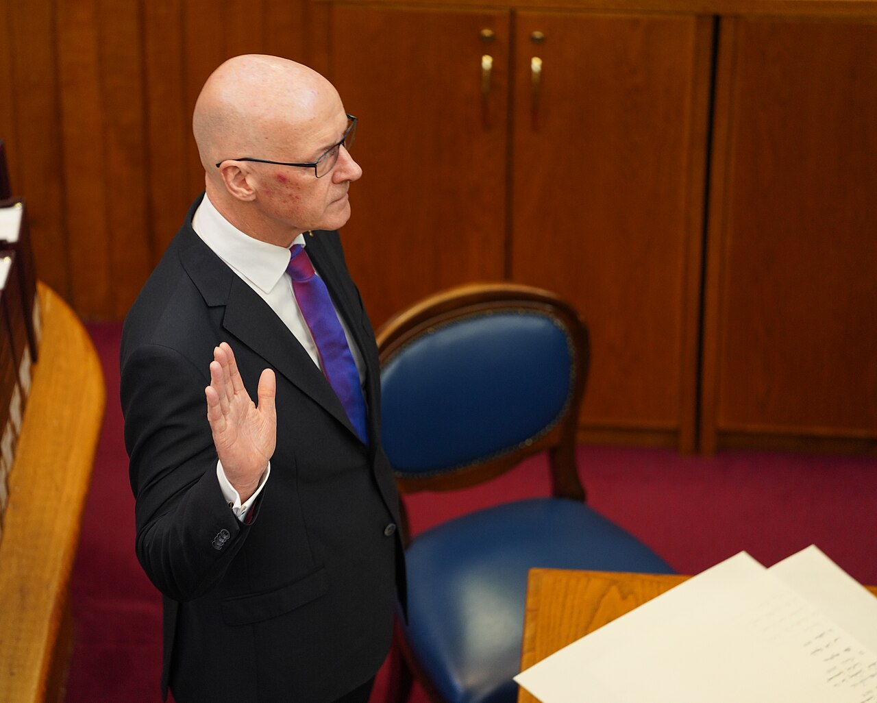 John Swinney being sworn in as 7th First Minister of the Scottish Parliament in 2024. Photo Scottish Government, CC BY 2.0