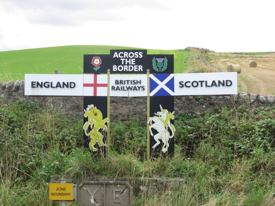 The sign where the East Coast mainline crosses the English-Scottish Border shwoing the lion and the unicorn. Picture: Colin Park CC By-SA.2