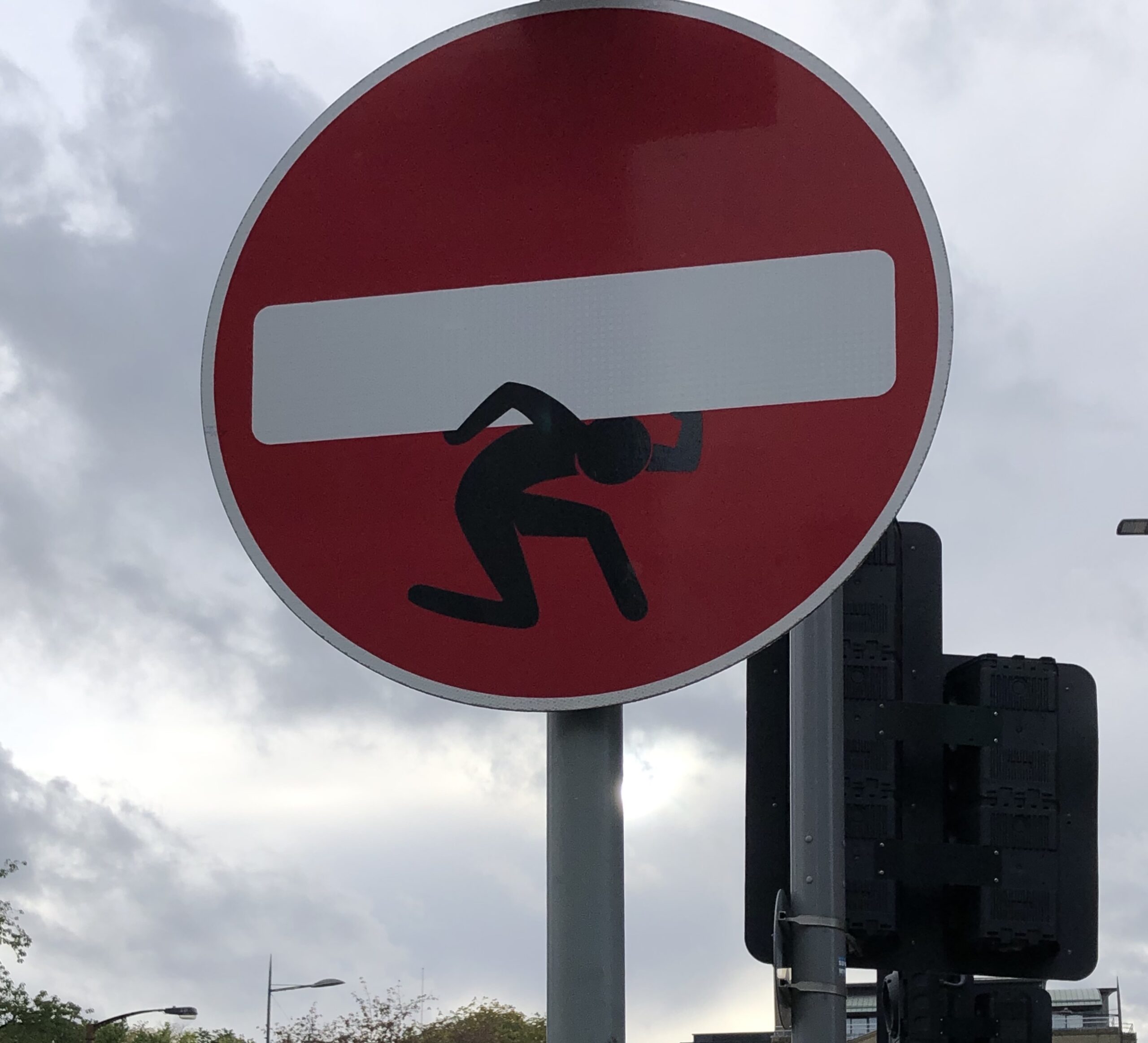 Street artist Clet Abraham's adapted roadsign in central Edinburgh. Photo Fay Young